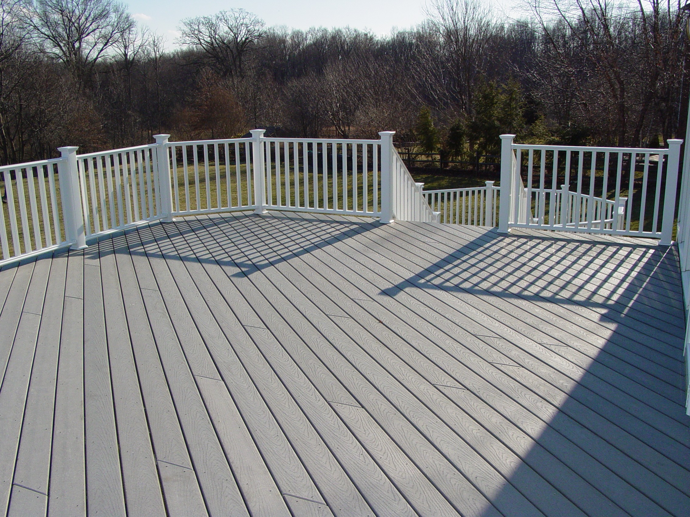 https://handymanconnection.com/wp-content/uploads/2025/05/Deck-siding-and-windows-4.jpg