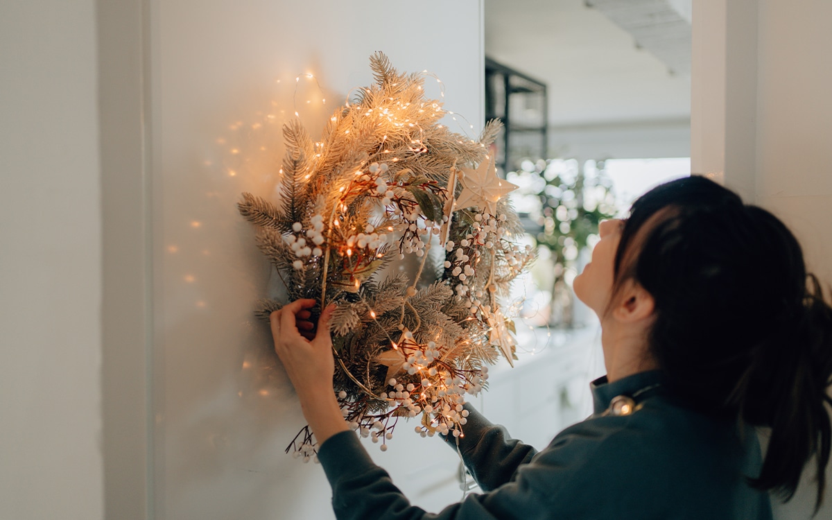 https://handymanconnection.com/wp-content/uploads/2023/11/holiday-decorator.jpg