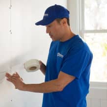 drywall handyman installing new drywall in home