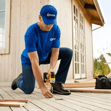 handyman providing deck repair services for customer